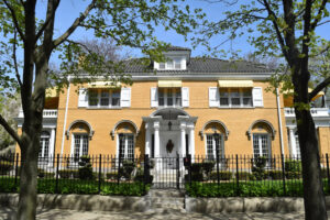 Mansion in the Jackson Park Highlands, Chicago, Illinois. Photo. Naked dude looking.